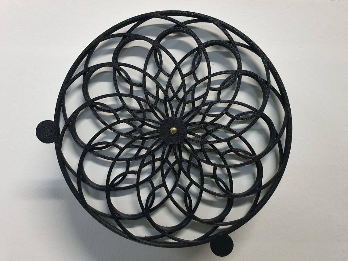 Reloj de pared de arte cinético